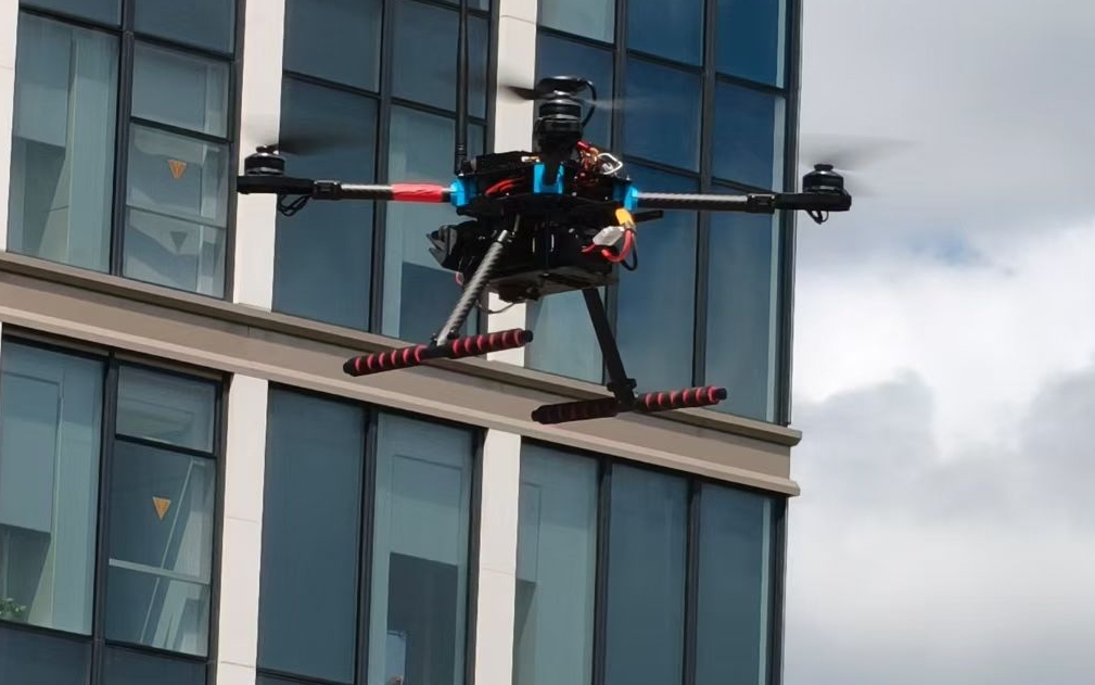 Tongji MRL UAV flying outdoors against the sky