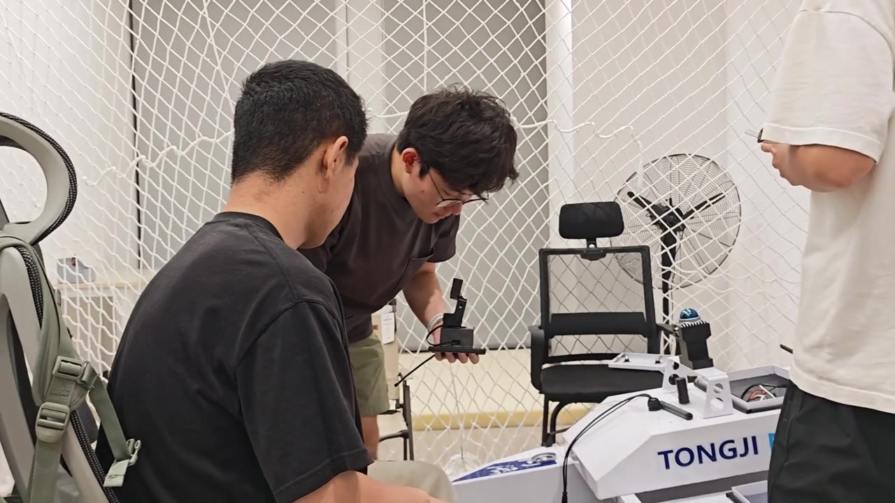 Team members assembling hardware on the Tongji MRL USV